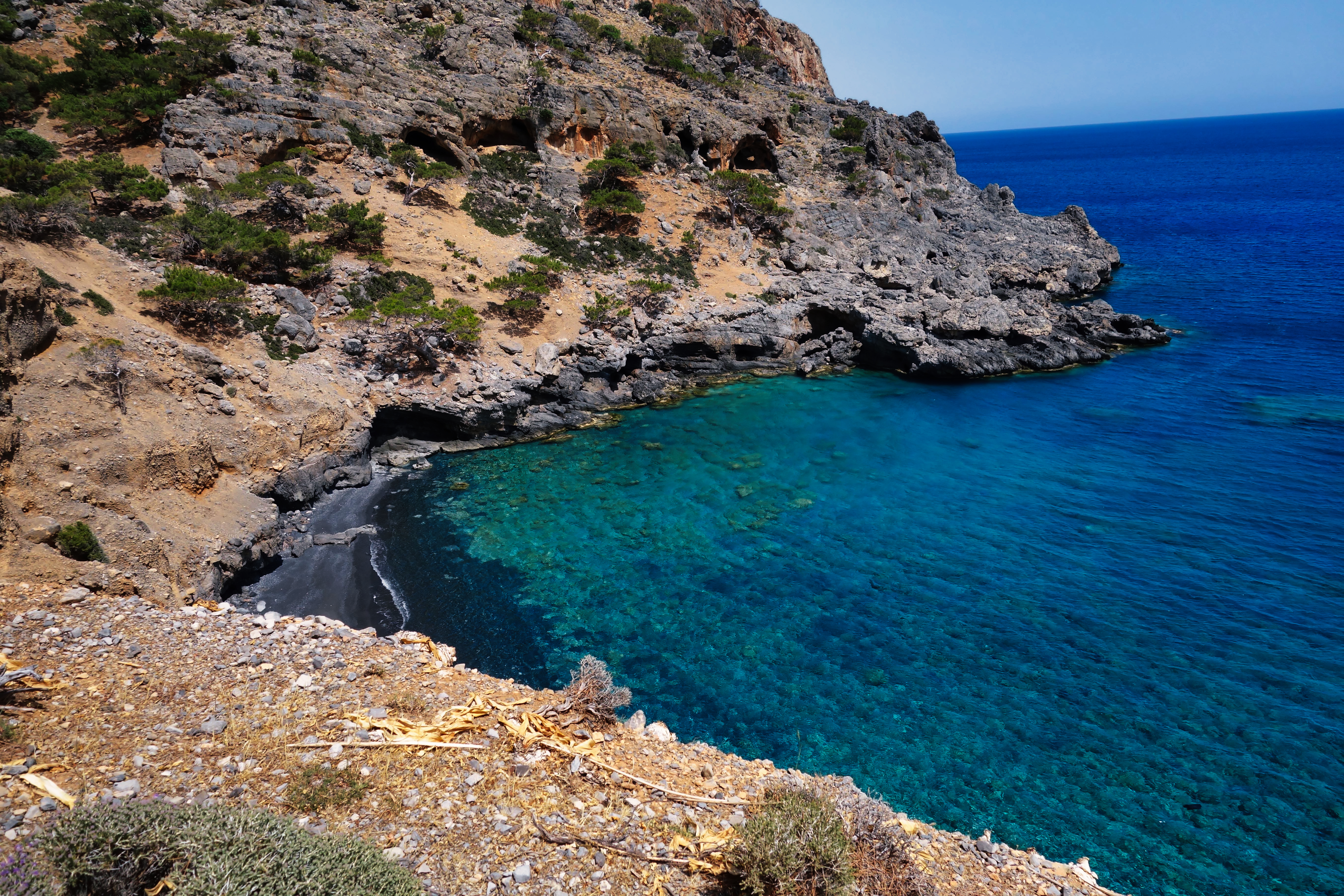 Hidden Mediterranean cove with emerald waters